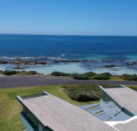 Boathouse nearly in the water  wonderful views